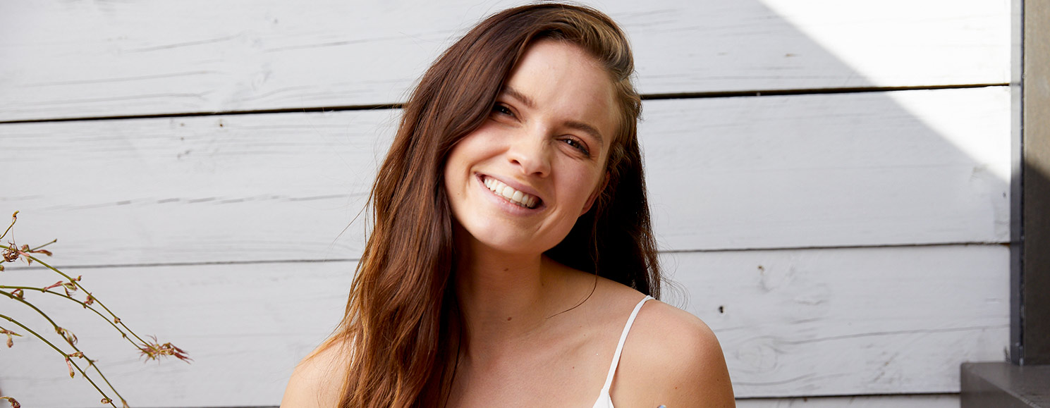 Laura Henshaw smiles at the camera 