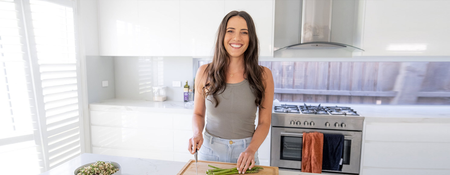 AIA Vitality | Eat Well | Marika Day prepares healthy food in her kitchen