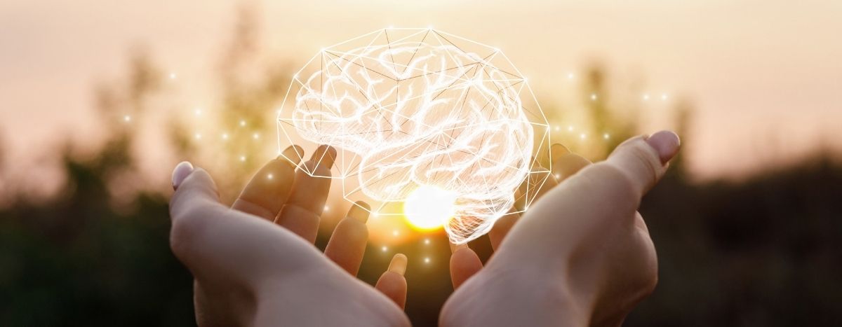 Illustration of handd holding a holographic brain