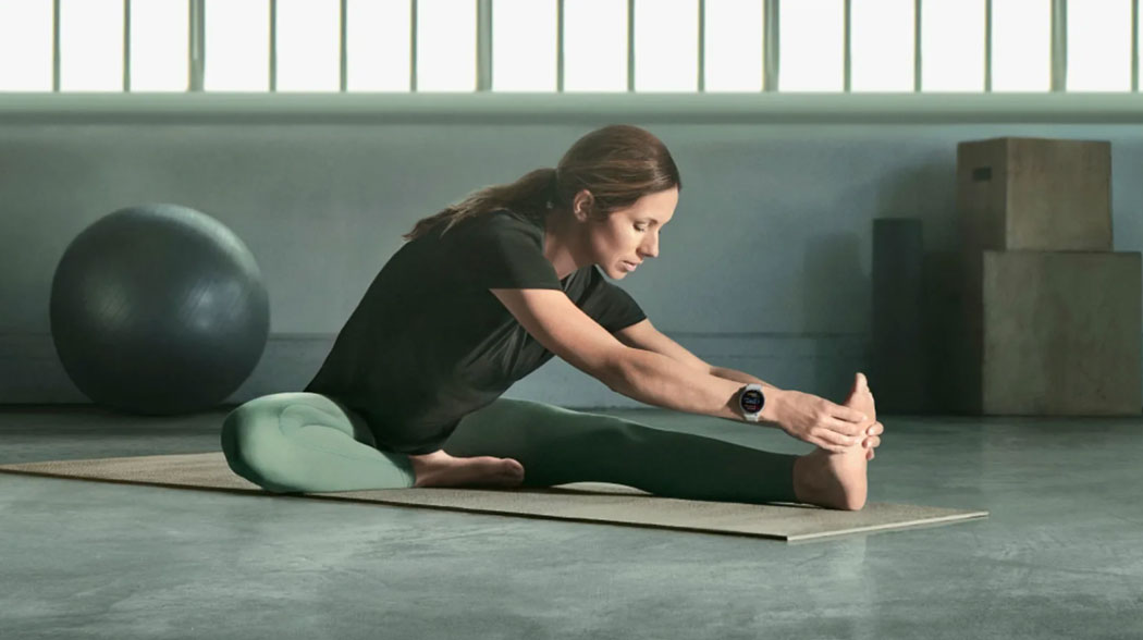 Woman stretching - Garmin Watch