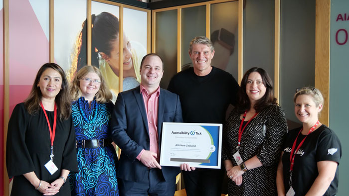 AIA NZ staff holding the award